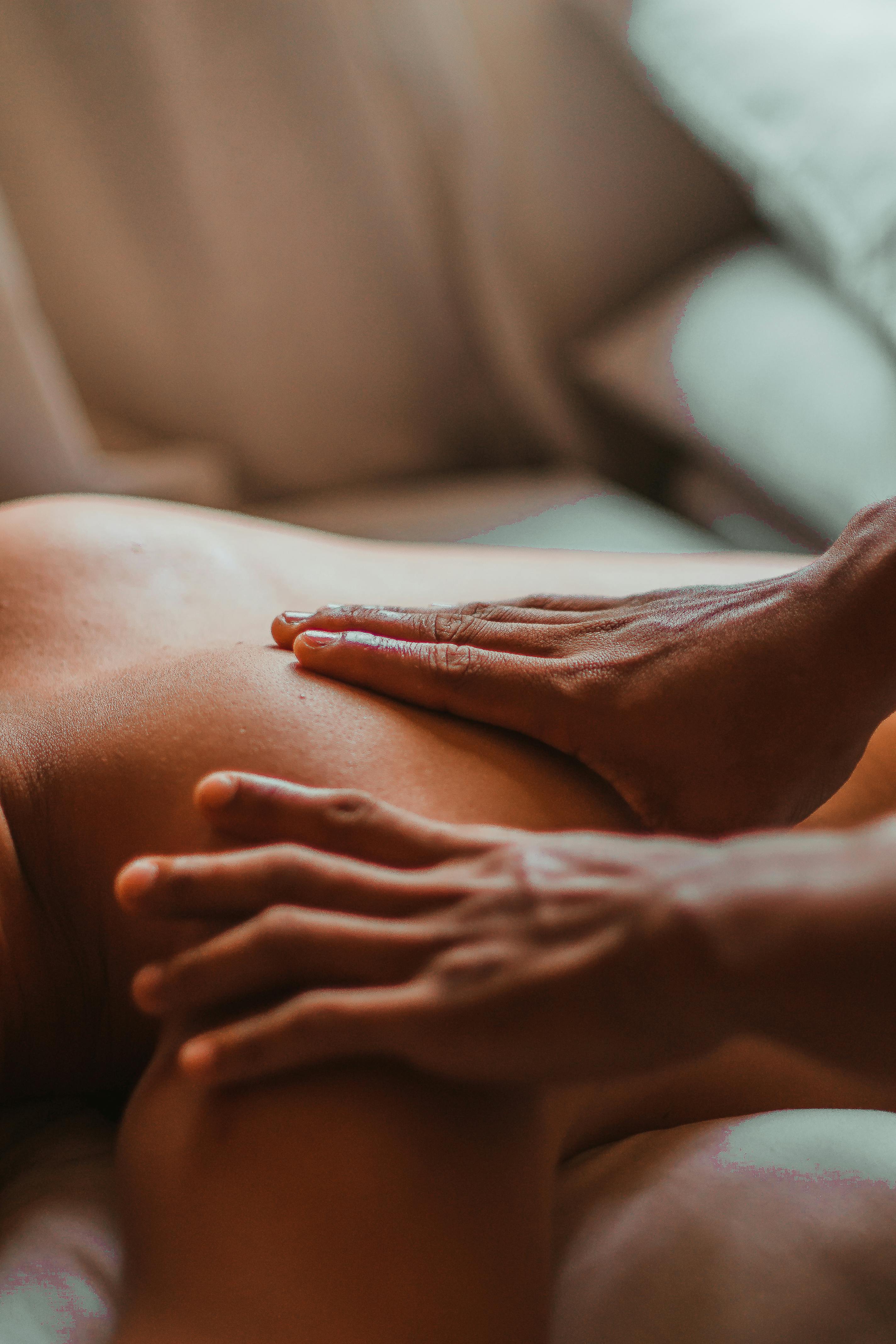 A person receiving a massage in a calm and serene environment